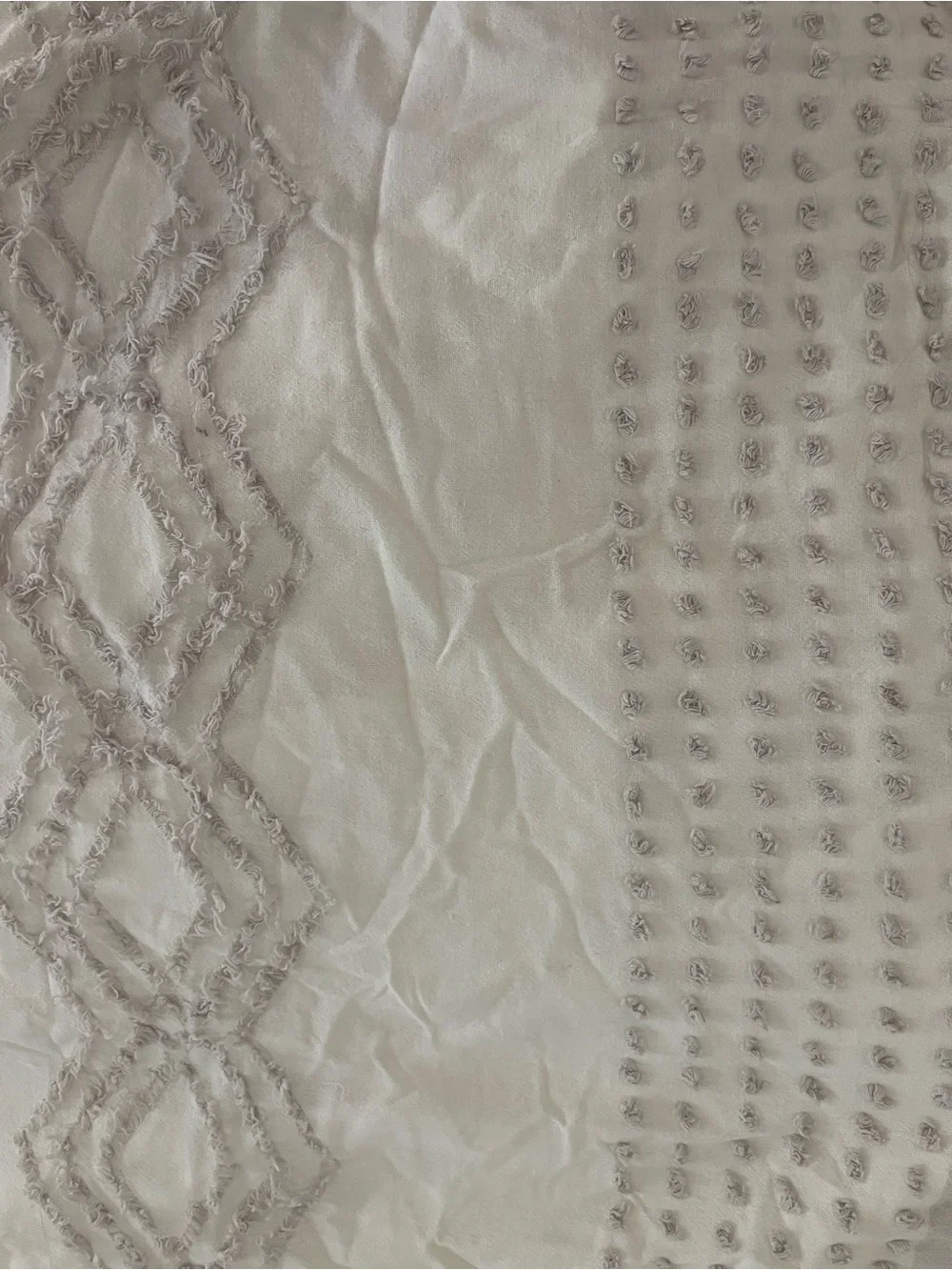 White duvet cover with purple embellishments